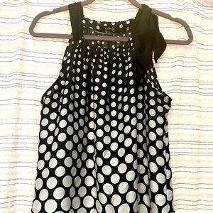 Sleeveless polka dot blouse